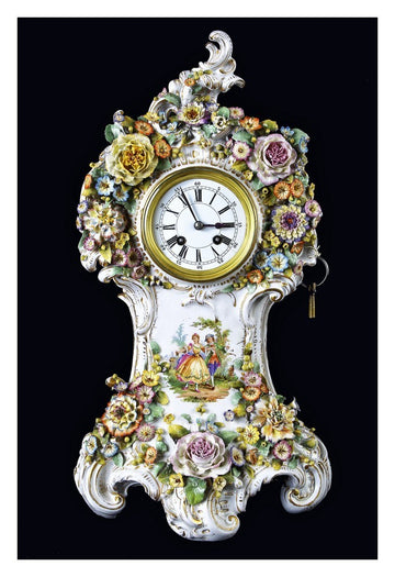 Extraordinary porcelain mantel clock richly decorated with polychrome floral motifs