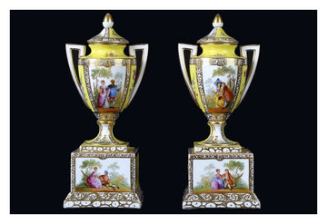 Pair of small porcelain amphora vases with lids