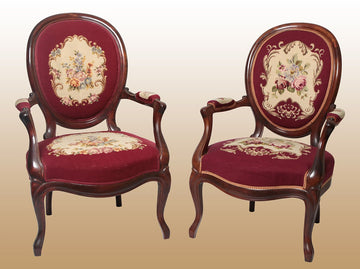 Pair of antique French Louis Philippe mahogany medallion armchairs from the 1800s