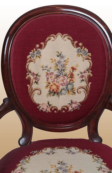 Pair of antique French Louis Philippe mahogany medallion armchairs from the 1800s