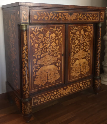 Antique Dutch sideboard from 1700 with two doors with floral inlays