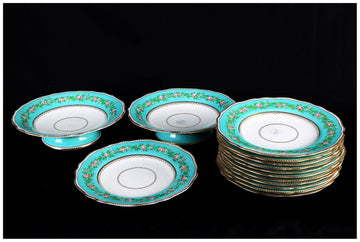 Antique English porcelain dessert service decorated in green and gold