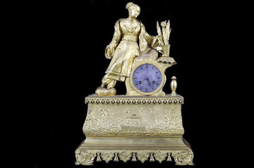 Antique French Parisian mantel clock in mercury gilt bronze from 1800
