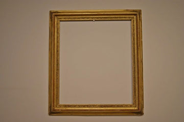 Antique French rectangular frame from 1800 in gilded wood carvings