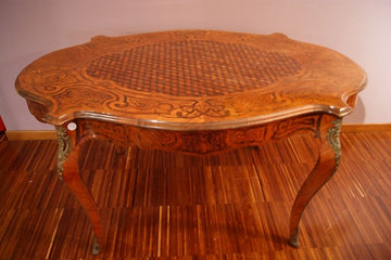 Antique French Louis XV style center table from 1800 with inlays