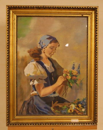 Antique watercolor from the 1800s depicting a woman with flowers