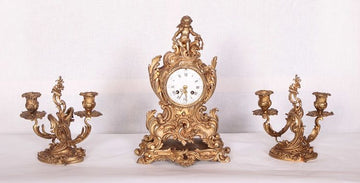 Tris orologio e candelieri stile Luigi XV