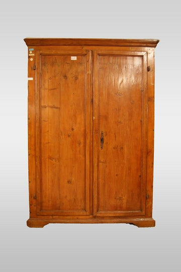 Antique rustic Italian wardrobe from the 1700s in fir wood