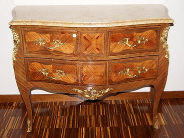 Antique French chest of drawers from 1800 Louis XV style with caryatids and bronzes