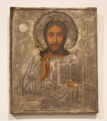 Icon depicting the face of Jesus with engraved silver cover