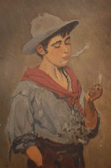 Antique oil on panel from the early 1900s depicting a boy with a cigarette
