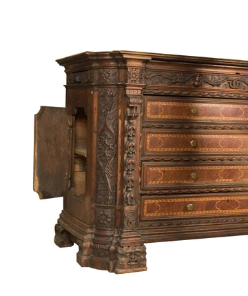 Antique Italian chest of drawers from the 1500s in richly carved walnut