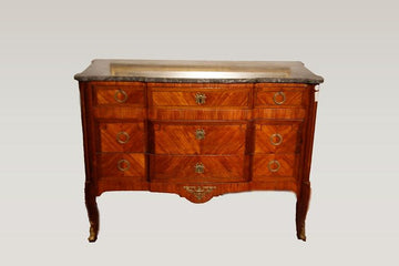 19th century French Transition style chest of drawers in mahogany and bois de rose