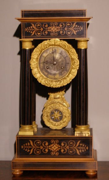 Antique inlaid Charles X mantel clock from 1800