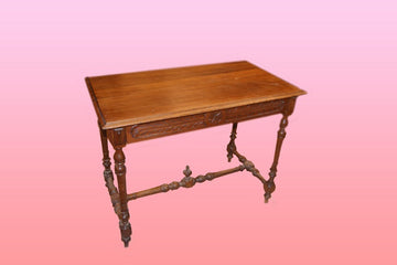 French writing table from the 19th century with turned base
