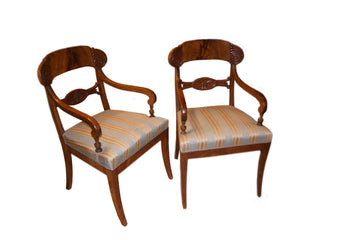 Group of 4 Biedermeier armchairs in mahogany wood with carved backrests