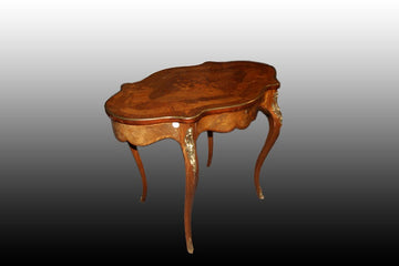 French center table from the 19th century, Louis XV style, richly finished with bronzes and inlays