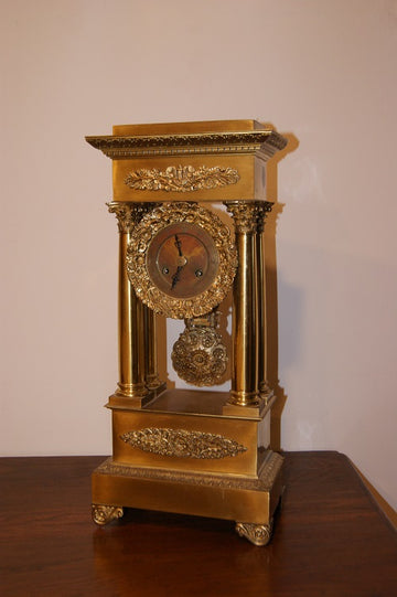 1800s French Empire Style mantel clock in mercury-gilt bronze