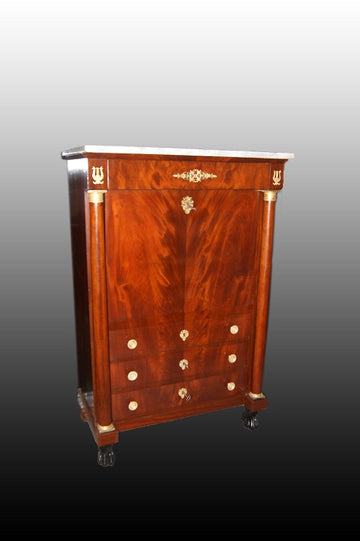 French Empire style secretaire desk chest from the mid 1800s in mahogany wood with marble and bronzes