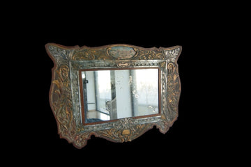 Very particular mirror from 1900 with painted leather frame