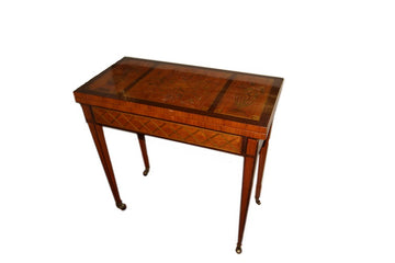 Early 19th century French Louis XVI style game table in walnut and mahogany