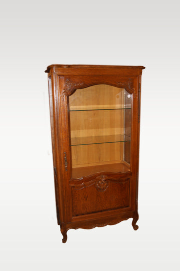 French display cabinet from the late 19th century Provençal style in oak wood with carvings
