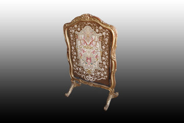 French spark screen from the 1800s in gold leaf gilded wood with small stitch embroidered fabric