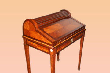 Small French Louis XVI style writing table in mahogany and bois de rose
