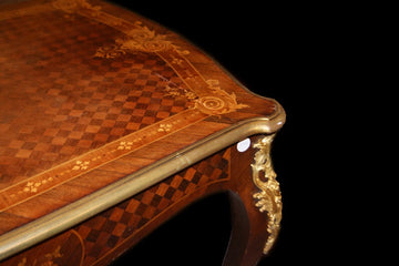 French mid-1800s Louis XV style writing table with rich inlay motifs