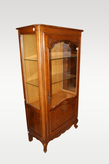 French display cabinet from the late 19th century Provençal style in oak wood with carvings