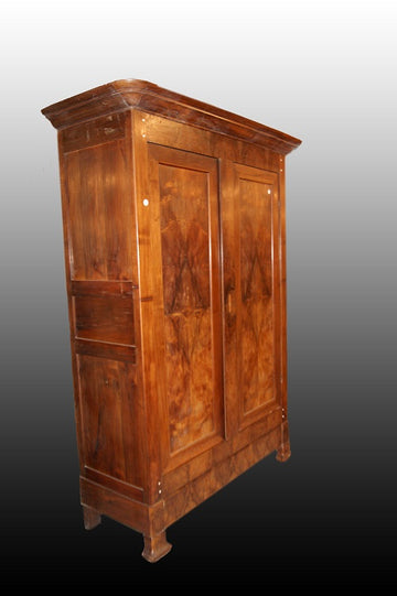 French Directoire style wardrobe in walnut and walnut from the 19th century