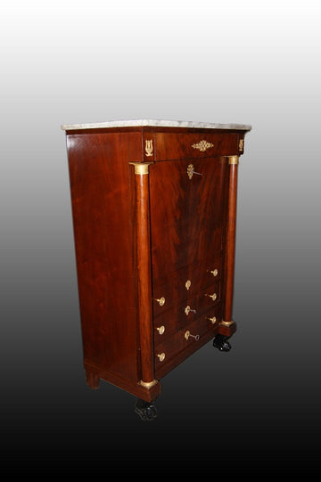 French Empire style secretaire desk chest from the mid 1800s in mahogany wood with marble and bronzes