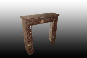 Small French fireplace from the 19th century in Empire style red marble