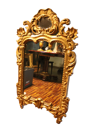 Miroir mural en bois finement sculpté et doré - XIXe siècle