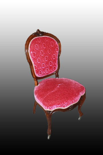 Groupe de 4 chaises de style Louis Philippe en palissandre à motifs sculptés