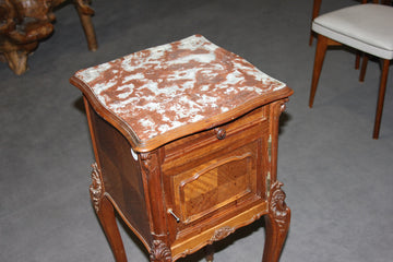 French bedside table in Louis Philippe style with carvings and marble top, 19th century