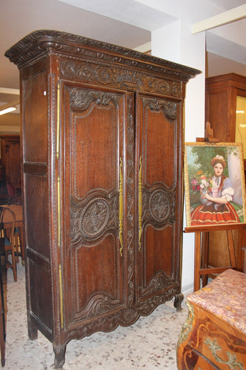 French Normandy 2-Door Walnut Wardrobe with Carved Motifs