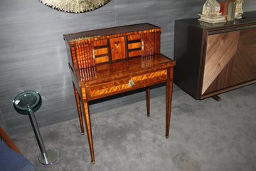 Small French Writing Desk from the Early 1800s, Richly Inlaid in the Louis XVI Style