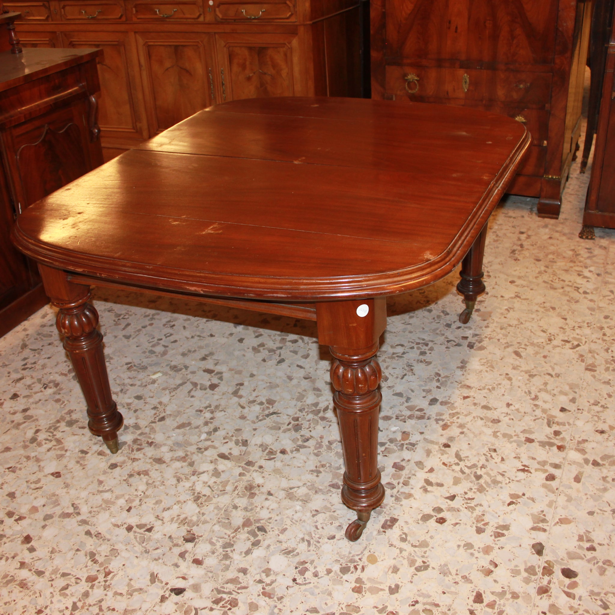 Tavolo allungabile inglese della seconda metà 1800 stile Vittoriano in legno di mogano