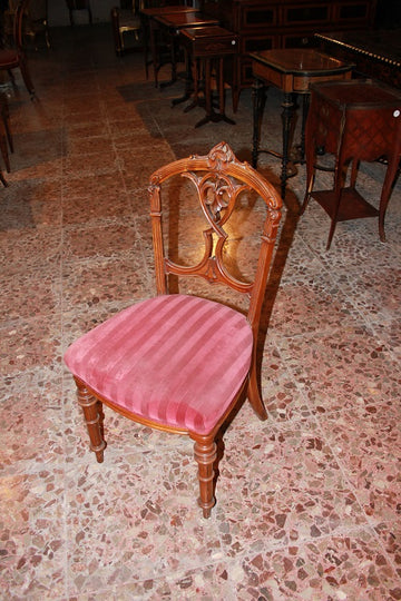 Group of 4 walnut chairs with 19th century Victorian style carving motifs