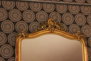 Large French gilded Louis XV style mirror from the 1800s with cymatium