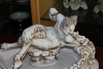 Large French Centerpiece from the 19th century in white porcelain with Faun Sculpture