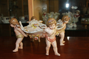 Centrotavola Alzata / Alzatina in porcellana del 1800 decorata con Putti e motivi Floreali