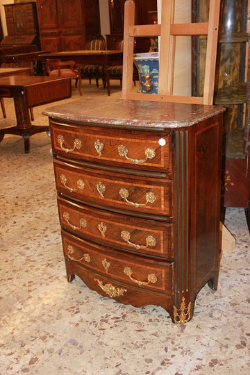 Small French Regency style chest of drawers with 4 drawers, marble top and gilded bronzes