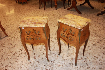 Pair of Louis XV inlaid bedside cabinets with marble top and rich inlay motifs