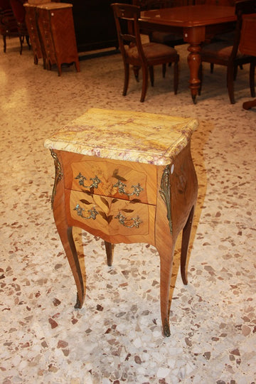 Pair of Louis XV inlaid bedside cabinets with marble top and rich inlay motifs