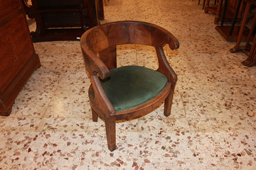 Fauteuil de style Empire en bois d'acajou et plume d'acajou du début du XIXème siècle