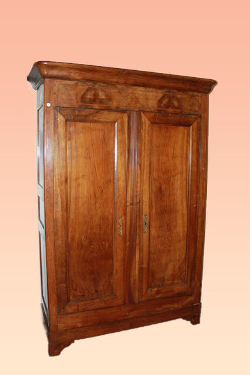 Large Directoire style wardrobe in 19th century walnut with marquetry thread