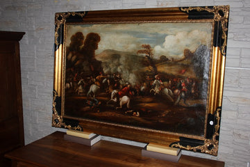 Oil on canvas from the early 20th century depicting a battle