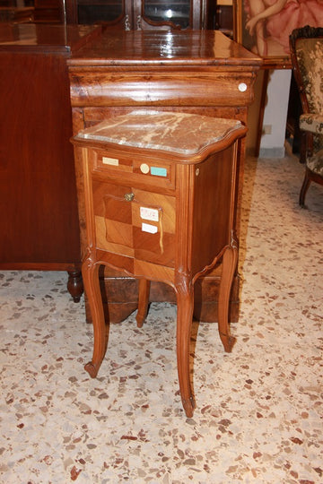 Pair of Louis Philippe style bedside cabinets in walnut wood from the 19th century with marble and carvings